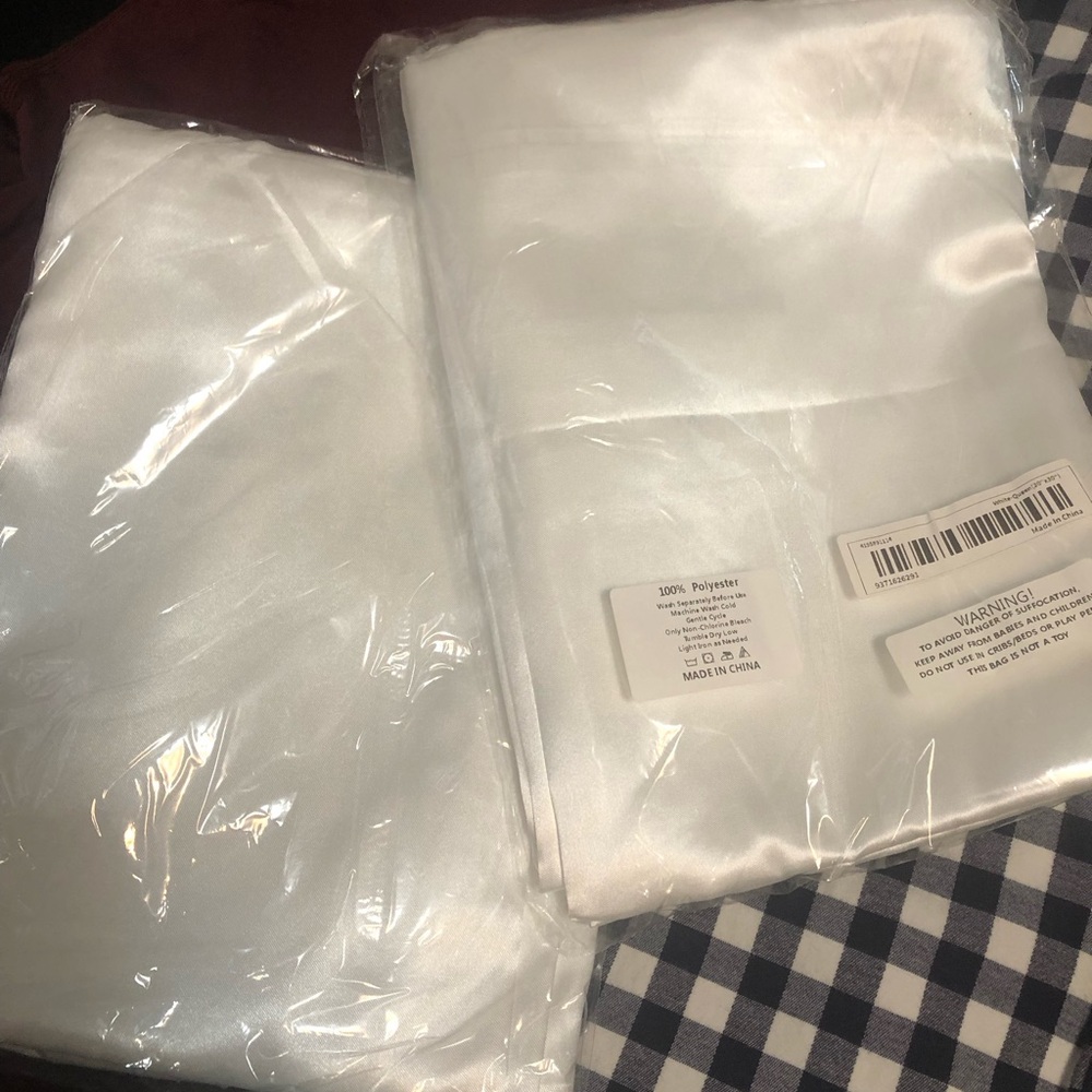 Polyester pillow cases. New in bag.